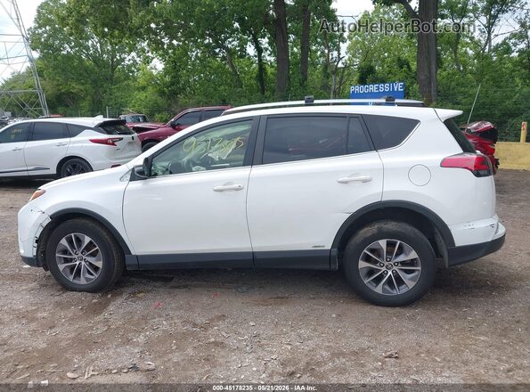 JTMRJREV9JD236749 2018 TOYOTA RAV4 HYBRID White 360 interior view