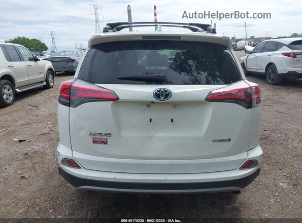 JTMRJREV9JD236749 2018 TOYOTA RAV4 HYBRID White 