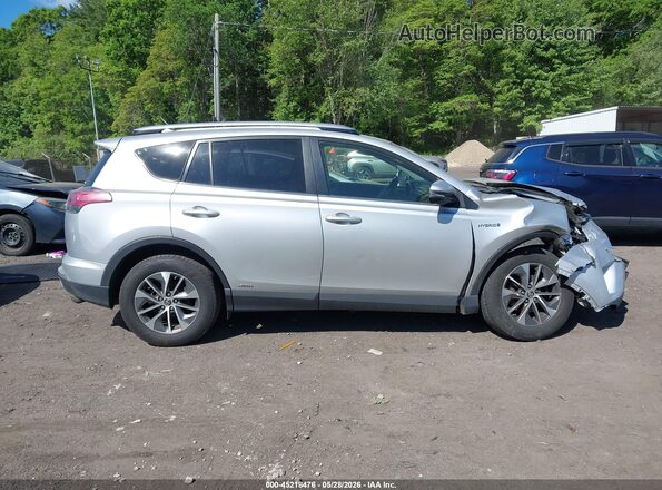 JTMRJREVXGD031983 2016 TOYOTA RAV4 HYBRID Silver Вид задньої частини салону