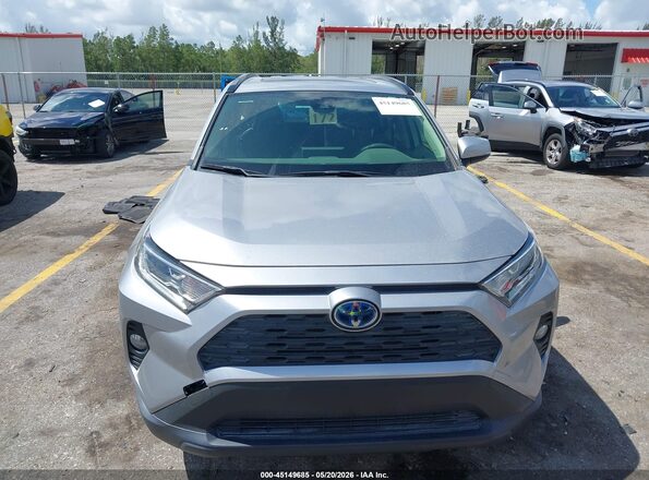 JTMRWRFV0MD133367 2021 TOYOTA RAV4 HYBRID Silver Rear interior view