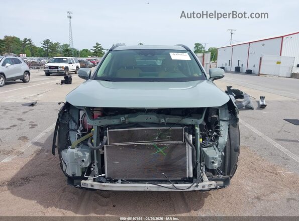 JTMRWRFV1KD027619 2019 TOYOTA RAV4 HYBRID Teal Rear interior view