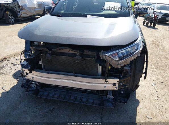JTMW1RFV0KD032747 2019 TOYOTA LE Gray Front view