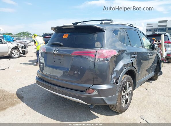 JTMWFREV1GD086049 2016 TOYOTA RAV4 Gray 