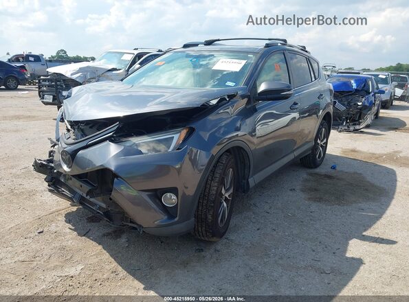 JTMWFREV1GD086049 2016 TOYOTA RAV4 Gray 