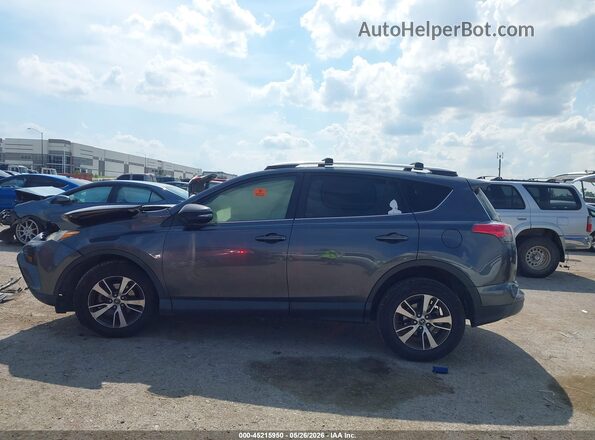 JTMWFREV1GD086049 2016 TOYOTA RAV4 Gray 