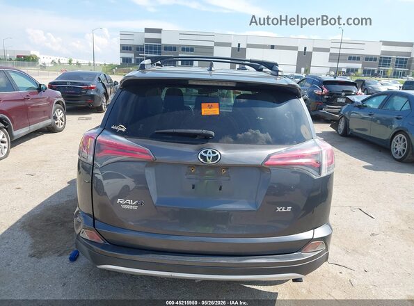 JTMWFREV1GD086049 2016 TOYOTA RAV4 Gray 
