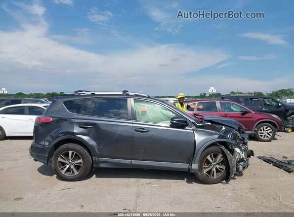 JTMWFREV1GD086049 2016 TOYOTA RAV4 Gray 