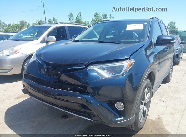 JTMWFREV2JJ211035 2018 TOYOTA RAV4 Blue Widok z przodu