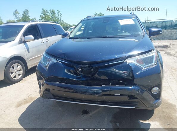 JTMWFREV2JJ211035 2018 TOYOTA RAV4 Blue Widok zestawu wskaźników
