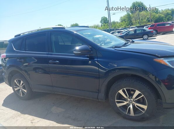 JTMWFREV2JJ211035 2018 TOYOTA RAV4 Blue Widok wnętrza z tyłu