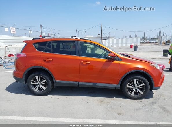 JTMWFREV3GJ081856 2016 TOYOTA RAV4 Orange 