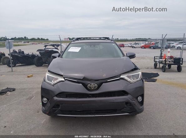 JTMWFREV3HJ124755 2017 TOYOTA RAV4 Gray Widok wnętrza z tyłu