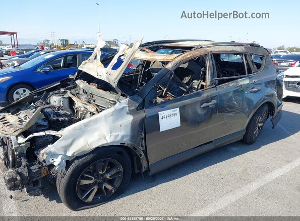 JTMWFREV4HJ114638 2017 TOYOTA RAV4 Gray Widok z przodu