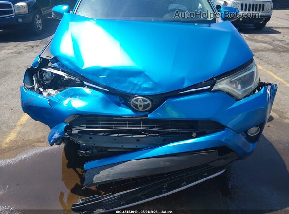 JTMWFREV4HJ705942 2017 TOYOTA RAV4 Blue Вид спереду