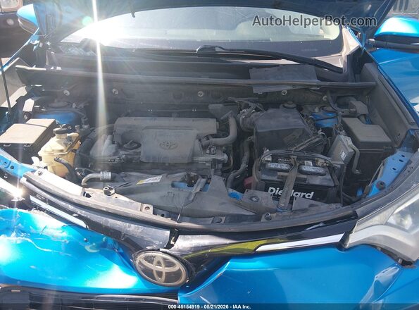 JTMWFREV4HJ705942 2017 TOYOTA RAV4 Blue Вид ззаду