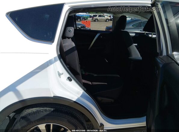 JTMWFREV4JD123070 2018 TOYOTA RAV4 White Vista de la etiqueta del VIN