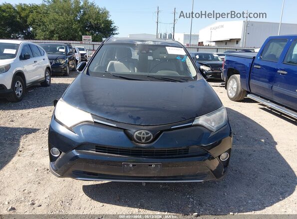 JTMWFREV4JJ738302 2018 TOYOTA LE Blue Вид задньої частини салону