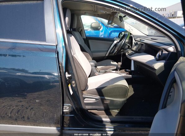 JTMWFREV4JJ738302 2018 TOYOTA LE Blue Вид салону спереду