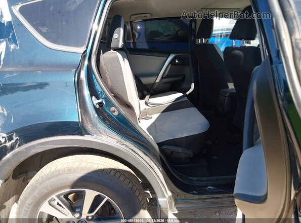 JTMWFREV4JJ738302 2018 TOYOTA LE Blue Вид наклейки з VIN-кодом
