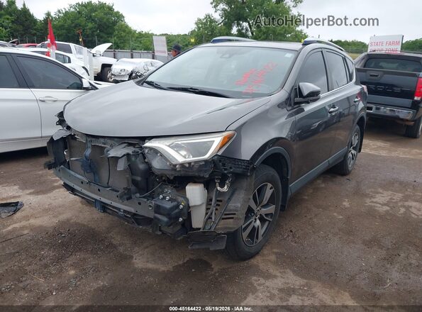 JTMWFREV5HJ706808 2017 TOYOTA RAV4 Gray Front left
