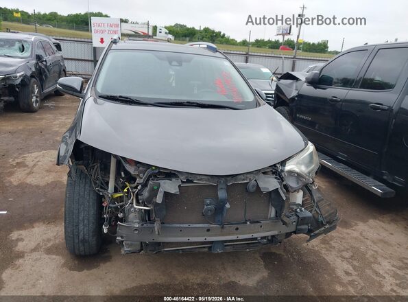 JTMWFREV5HJ706808 2017 TOYOTA RAV4 Gray Rear interior view
