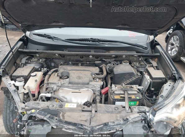 JTMWFREV5HJ706808 2017 TOYOTA RAV4 Gray Rear view