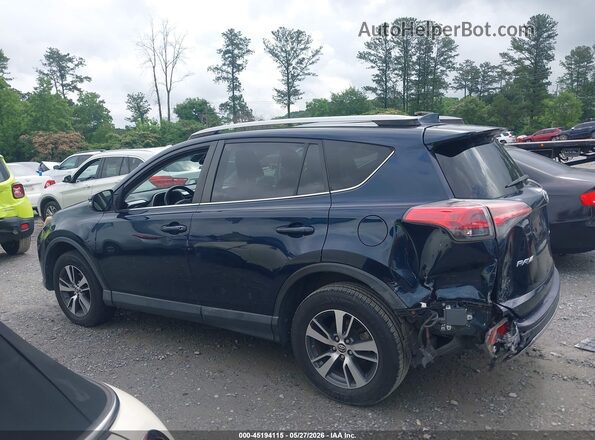 JTMWFREV5JJ182226 2018 TOYOTA RAV4 Синий Вид задней части салона