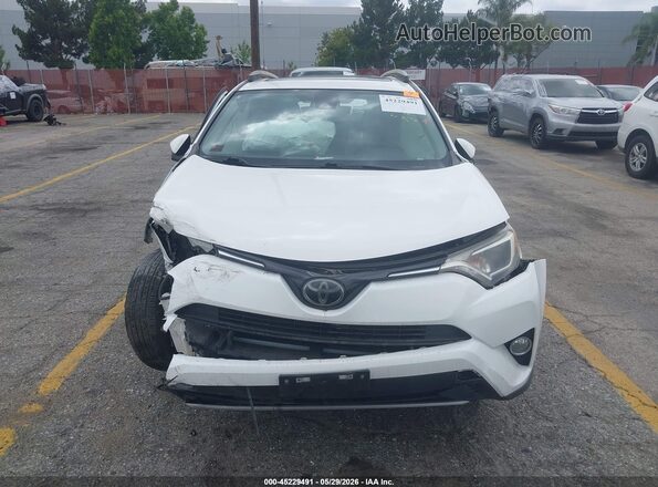 JTMWFREV5JJ744707 2018 TOYOTA RAV4 White Սարքավորումների վահանակի տեսք