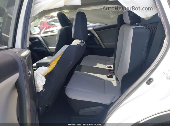 JTMWFREV6JJ737698 2018 TOYOTA LE White Vista de la etiqueta del VIN