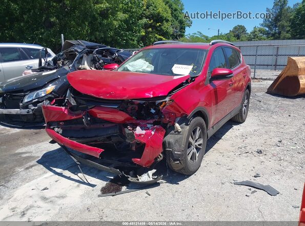 JTMWFREV7HJ120885 2017 TOYOTA RAV4 Red Առջևի ձախ երեք քառորդ տեսարան