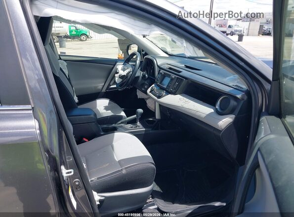 JTMWFREVXGJ068487 2016 TOYOTA RAV4 Gray Front interior view