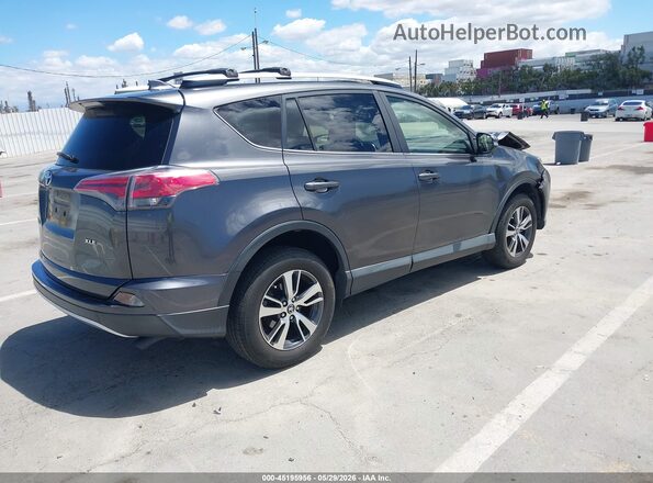 JTMWFREVXGJ068487 2016 TOYOTA RAV4 Gray Rear right