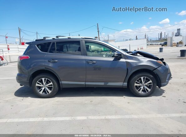 JTMWFREVXGJ068487 2016 TOYOTA RAV4 Gray Rear interior view