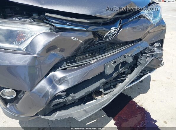 JTMWFREVXGJ068487 2016 TOYOTA RAV4 Gray 