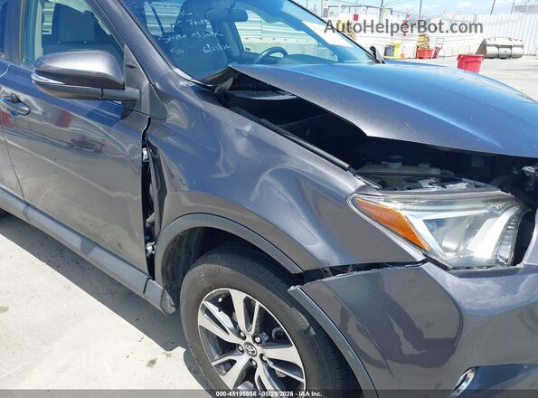 JTMWFREVXGJ068487 2016 TOYOTA RAV4 Gray 