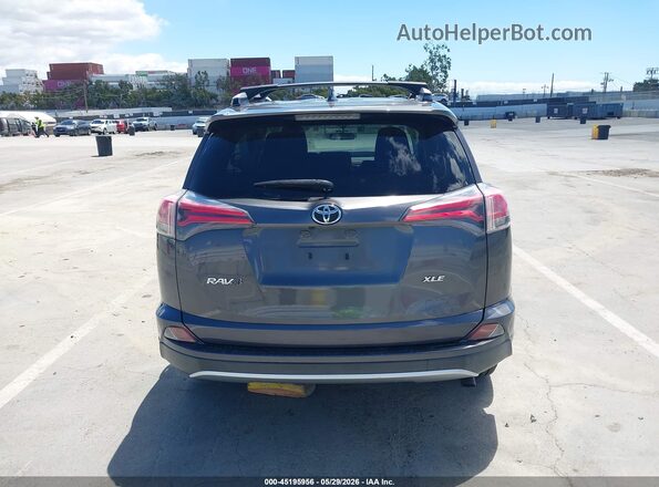 JTMWFREVXGJ068487 2016 TOYOTA RAV4 Gray 