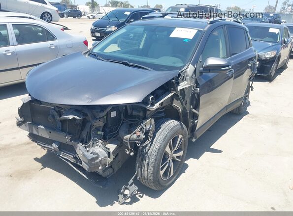 JTMWFREVXGJ073821 2016 TOYOTA RAV4 Gray წინა მარცხენა ხედი სამი მეოთხედიდან