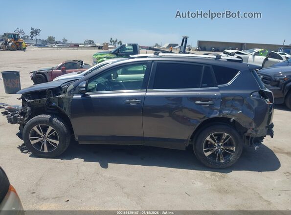 JTMWFREVXGJ073821 2016 TOYOTA RAV4 Gray 