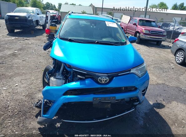JTMWFREVXHD107899 2017 TOYOTA RAV4 Синий Вид задней части салона