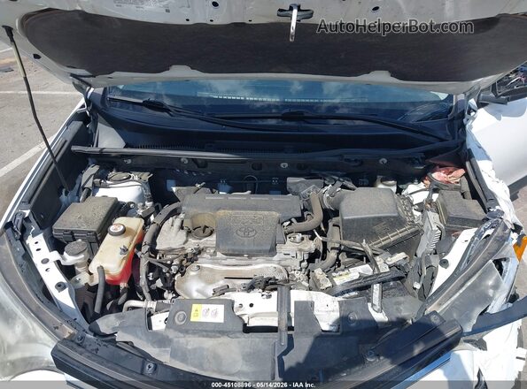 JTMWFREVXJD117516 2018 TOYOTA LE White Rear view