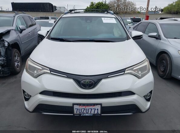 JTMYFREV7GJ099060 2016 TOYOTA LIMITED White Widok wnętrza z tyłu