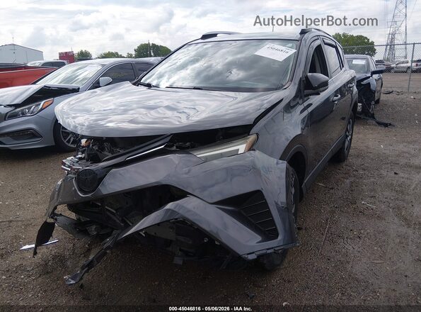 JTMZFREV1GJ061683 2016 TOYOTA LE Gray Front left