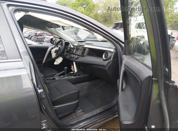 JTMZFREV1GJ061683 2016 TOYOTA LE Gray Front interior view