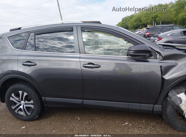 JTMZFREV1GJ061683 2016 TOYOTA LE Gray Rear interior view
