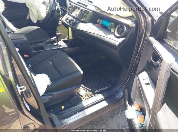 JTMZFREV1JJ181085 2018 TOYOTA RAV4 Gray Front interior view