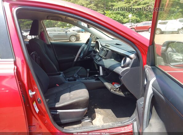 JTMZFREV2GJ093896 2016 TOYOTA RAV4  Front interior view