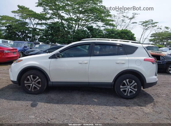 JTMZFREV2JJ745844 2018 TOYOTA LE White 