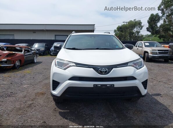 JTMZFREV2JJ745844 2018 TOYOTA LE White Вид задньої частини салону