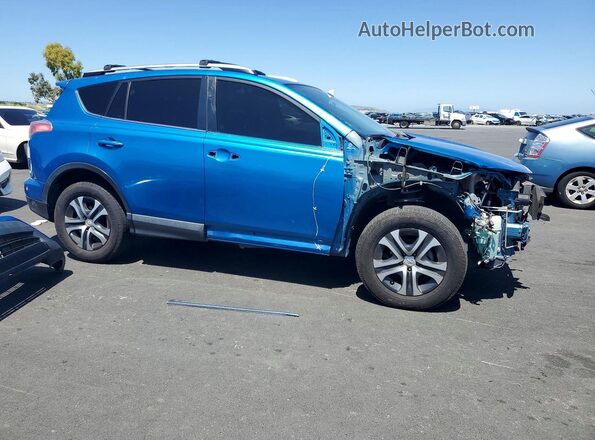 JTMZFREV4GJ063508 2016 TOYOTA RAV4 Blue 