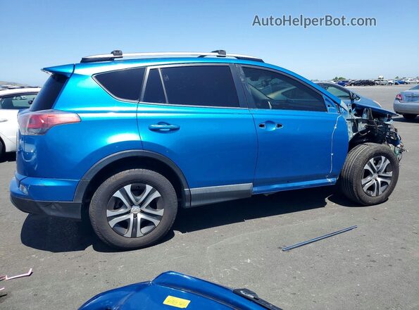 JTMZFREV4GJ063508 2016 TOYOTA RAV4 Blue 